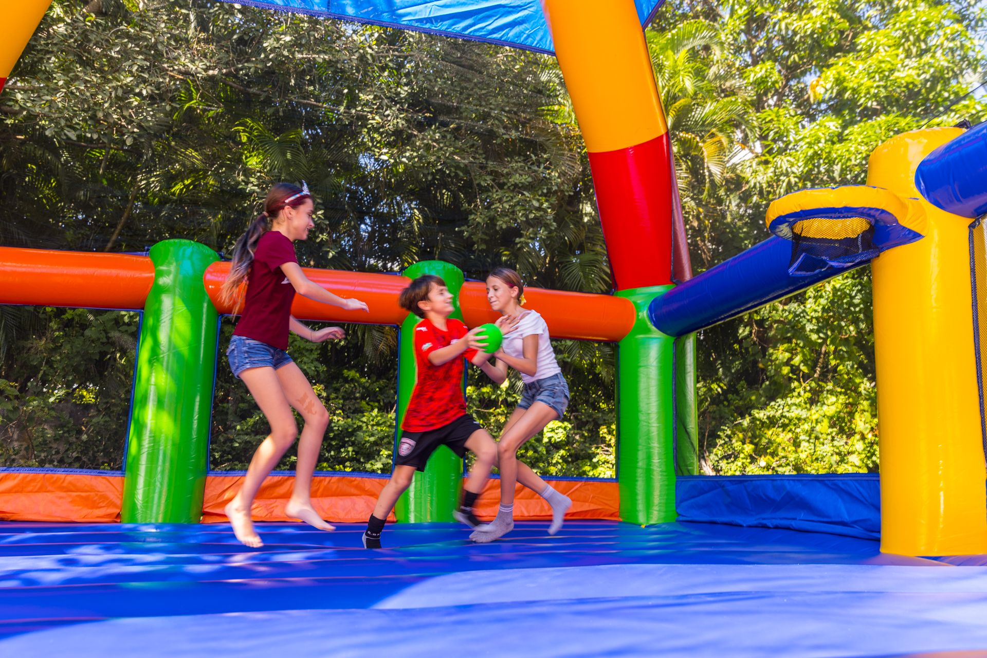 Kids bounce on the big inflatable trampoline